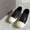 6930f01b6e68136f4d9b395a Rick Owens Style Slip-on Leather Sneakers with Oversized Frame