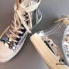6930f1706e68136f4d9b3b2b RO DRKSHDW Liquid Silver High-Top Lace-Up