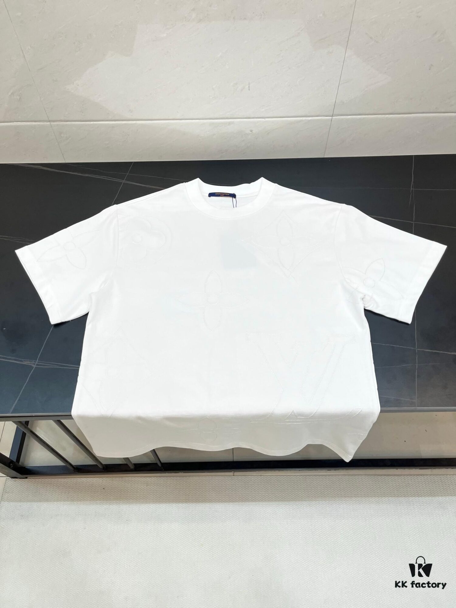 6930f5096e68136f4d9b3f80 Louis Vuitton LV Letter Logo Embroidered All-Over Round Neck Short Sleeve T-Shirt, Heavy Craftsmanship Brand Signature Design, Made from 280g Pure Cotton Double Yarn Fabric, Comfortable and Soft to Wear, Neat Embroidery Stitching, High Version Comparable at Will, Complete with Three Labels