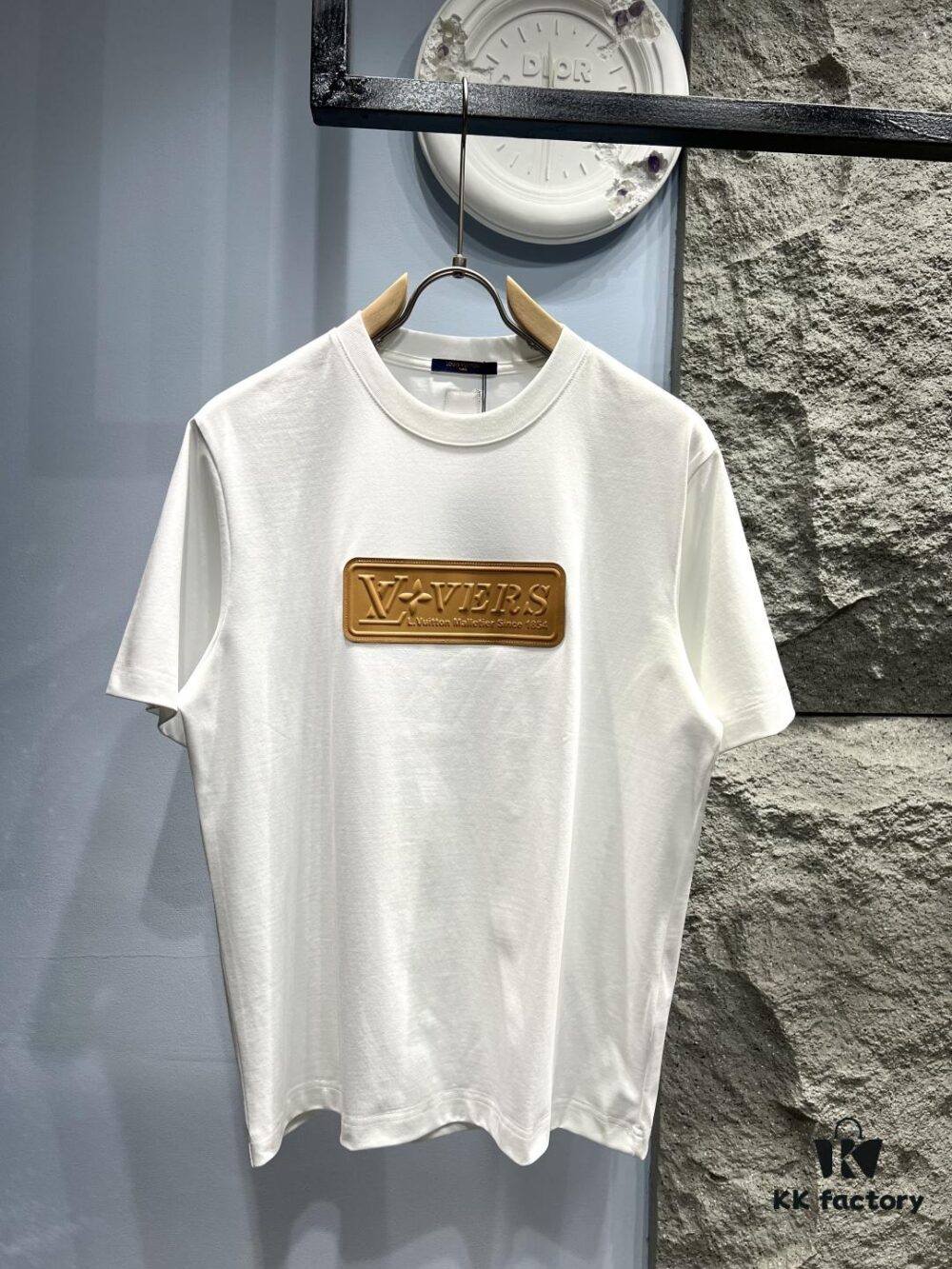 6930fb136e68136f4d9b4643 Louis Vuitton Short Sleeve T-Shirt with Leather Patch Signature Detail