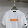 6930fb766e68136f4d9b46a5 LV Louis Vuitton Embossed Leather Patch Knitted Short-Sleeve T-Shirt