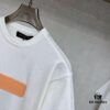 6930fb766e68136f4d9b46a6 LV Louis Vuitton Embossed Leather Patch Knitted Short-Sleeve T-Shirt