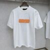 6930fb776e68136f4d9b46a7 LV Louis Vuitton Embossed Leather Patch Knitted Short-Sleeve T-Shirt