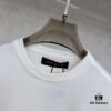 6930fb776e68136f4d9b46a8 LV Louis Vuitton Embossed Leather Patch Knitted Short-Sleeve T-Shirt