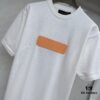 6930fb786e68136f4d9b46a9 LV Louis Vuitton Embossed Leather Patch Knitted Short-Sleeve T-Shirt