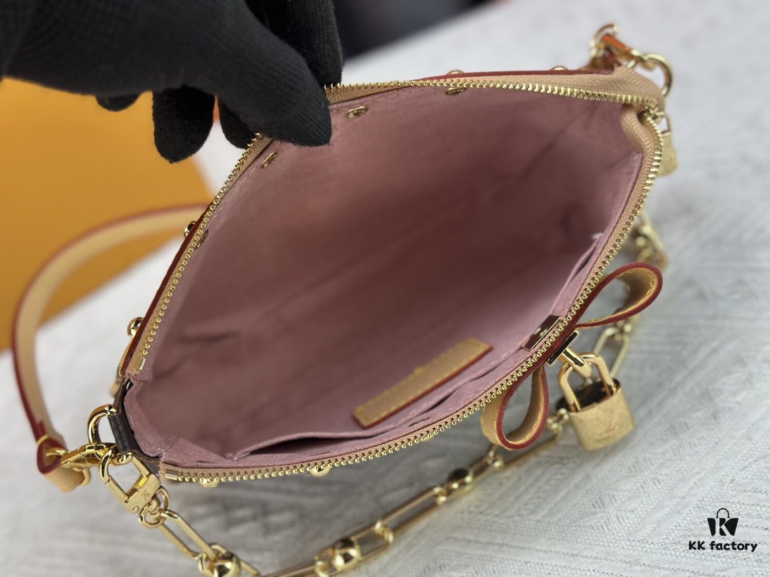 69310646908475d562cd8da0 M13666 Pochette Accessoires Bag – A playful interpretation of the iconic Monogram canvas with Takashi Murakami's vibrant Cherry Blossom motif, revisiting the Louis Vuitton x Murakami collaboration with bold, whimsical style.