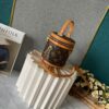 Upgraded Version [Exclusive Real Photo M82952 Damier Azur and Sunflower] This Nano Cannes Handbag features a cylindrical silhouette crafted from Monogram canvas, echoing the design of a makeup pouch.