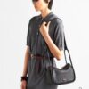 693109f8908475d562cd8e2e Prada's New Bag Design: A Fresh Take for Summer