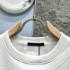 693113d0908475d562cd8ff3 Louis Vuitton Monogram Embroidered Jacquard Cut-out T-Shirt