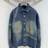 6931155f908475d562cd903e 1V 25SS New Arrival Utility Shirt Crafted from Cotton Denim with Sun-Faded Effect for Spring/Summer 2025, Featuring a Left Chest Pocket with Marque L.Vuitton Déposée Suede Patch, Mother-of-Pearl Buttons and Rivets Exuding Refined Charm, Perfectly Paired with Matching Trousers