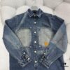 69311567908475d562cd9041 1V 25SS New Arrival Utility Shirt Crafted from Cotton Denim with Sun-Faded Effect for Spring/Summer 2025, Featuring a Left Chest Pocket with Marque L.Vuitton Déposée Suede Patch, Mother-of-Pearl Buttons and Rivets Exuding Refined Charm, Perfectly Paired with Matching Trousers