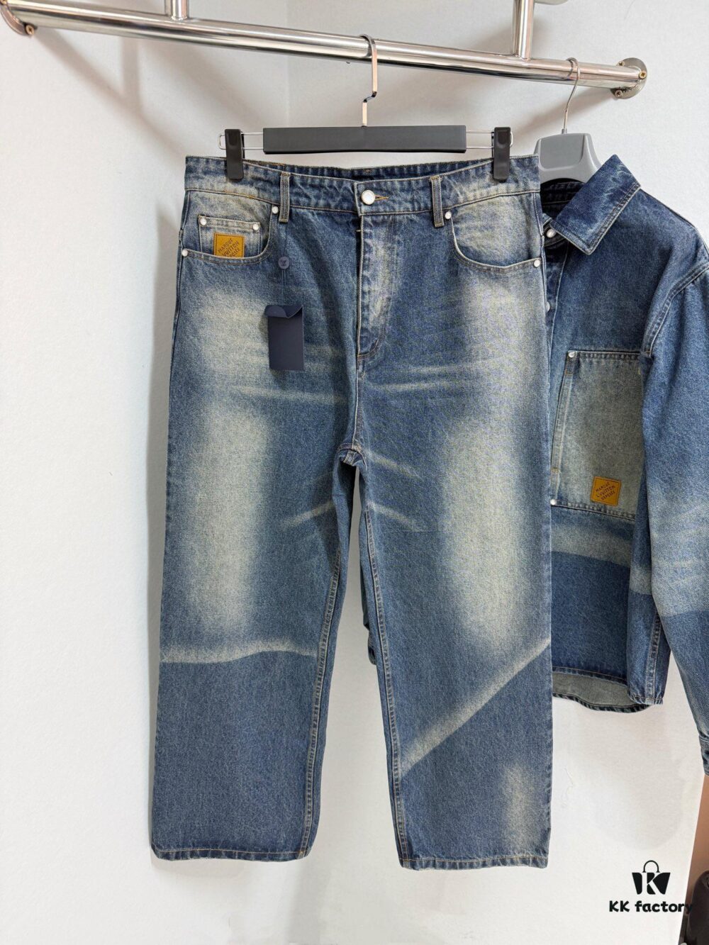 6931157b908475d562cd9045 1V 25ss New Arrival Denim Jeans Featuring Washed Denim with Sun-Faded Vintage Texture, Presented in a Minimalist Skate Silhouette for Spring/Summer 2025. Ticket Pocket Adorned with Suede 'Marque L.Vuitton Déposée' Patch, Pearlized Rivets and Rear Damier Label Refine the Details