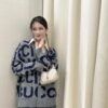 69312b20908475d562cd961b GUCCI Wool-Blend Knit Polo Collar Cardigan with Double G Logo Unisex