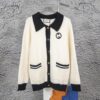 69312cfd908475d562cd96aa GUCCI Color-Block Button Knit Coat Made of High-End Wool Material