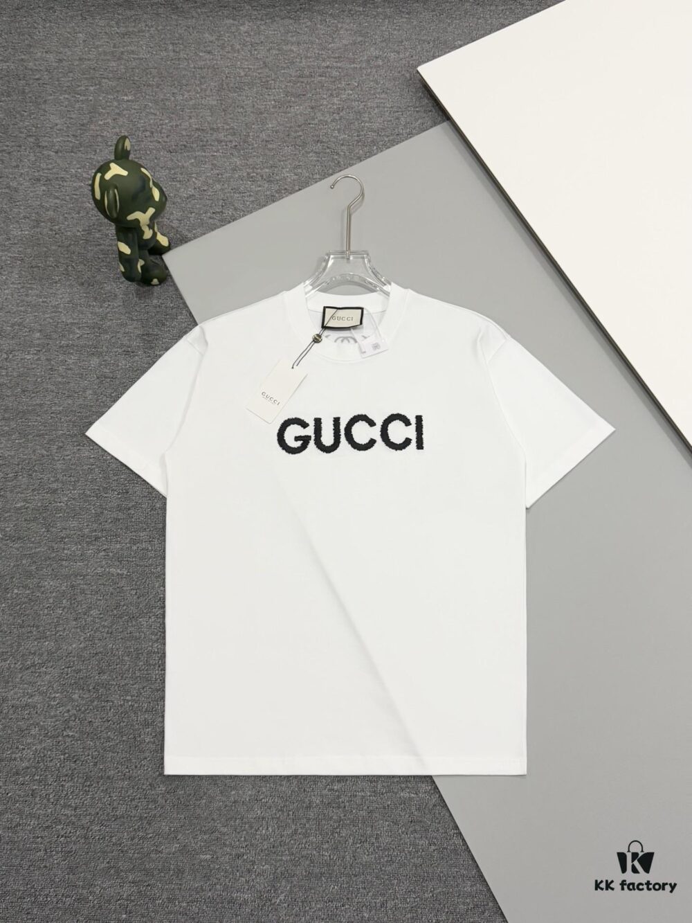 69312f98908475d562cd9785 High-End Gucci Style Premium Jump Stitch Embroidered Round Neck Short Sleeve T-Shirt, 280g Double-Yarn High Gram Weight 100% Combed Cotton, Pre-Shrunk 1x1 Double Yarn Washed Fabric Resists Deformation, Unisex Design with Official Website Details, Front and Back Letter Logo Embroidery, Patch on Reverse, Complete Triple Labels, Moisture-Proof Paper Packaging, Distinct from Market Standard Goods, Comfortable Fit with OXs Silhouette
