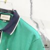 6931302b908475d562cd97a1 GUCCI Men's Polo Shirt with Notched Lapel, Color-Block Collar and Embroidered GG Logo