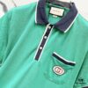6931302c908475d562cd97a2 GUCCI Men's Polo Shirt with Notched Lapel, Color-Block Collar and Embroidered GG Logo