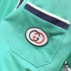 69313032908475d562cd97a4 GUCCI Men's Polo Shirt with Notched Lapel, Color-Block Collar and Embroidered GG Logo