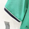 6931303c908475d562cd97a7 GUCCI Men's Polo Shirt with Notched Lapel, Color-Block Collar and Embroidered GG Logo