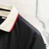 69313049908475d562cd97ab GUCCI Men's Polo Shirt with Notched Lapel, Color-Blocked Collar, and Embroidered GG Logo