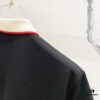 69313051908475d562cd97ad GUCCI Men's Polo Shirt with Notched Lapel, Color-Blocked Collar, and Embroidered GG Logo