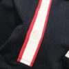 6931305a908475d562cd97b0 GUCCI Men's Polo Shirt with Notched Lapel, Color-Blocked Collar, and Embroidered GG Logo