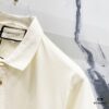 69313068908475d562cd97b4 GUCCI Lapel Polo Shirt with Red and Green Logo Belt Design