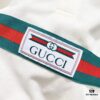 69313077908475d562cd97b7 GUCCI Lapel Polo Shirt with Red and Green Logo Belt Design