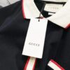 69313089908475d562cd97ba GUCCI Men's Polo Shirt with Notched Lapel, Color-Blocked Collar, and Embroidered GG Logo