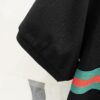 693130b3908475d562cd97c1 GUCCI Men's Polo Shirt with Notched Collar and Red-Green Web Stripe Logo Design