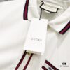GUCCI Men's Polo Shirt with Lapel, Embroidered Logo, Color-Block Striped Pocket Design