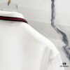 GUCCI Men's Polo Shirt with Lapel, Embroidered Logo, Color-Block Striped Pocket Design