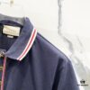 693130f7908475d562cd97d0 GUCCI Men's Polo Shirt with Lapel, Embroidered Logo, Color-Block Striped Pocket Design