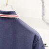 693130fe908475d562cd97d2 GUCCI Men's Polo Shirt with Lapel, Embroidered Logo, Color-Block Striped Pocket Design