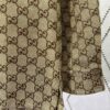 69313eda908475d562cd9b8b Gucci 25SS New Arrival Letter Interlocking Pattern Shirt Inspired by Founder Guccio Gucci's Name, Crafted in GG Canvas with Side Slits
