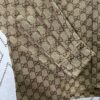 69313f01908475d562cd9b90 Gucci 25SS New Arrival Letter Interlocking Pattern Shirt Inspired by Founder Guccio Gucci's Name, Crafted in GG Canvas with Side Slits