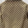 69313f1a908475d562cd9b96 Gucci 25SS New Arrival Letter Interlocking Pattern Shirt Inspired by Founder Guccio Gucci's Name, Crafted in GG Canvas with Side Slits