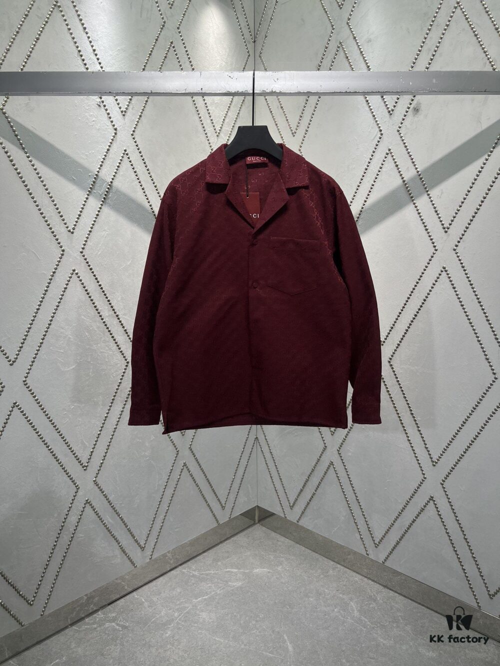 69313f22908475d562cd9b98 Gucci 25SS New Arrival Letter Intertwined Pattern Shirt Inspired by Founder Guccio Gucci's Name, Crafted in GG Canvas with Side Slits