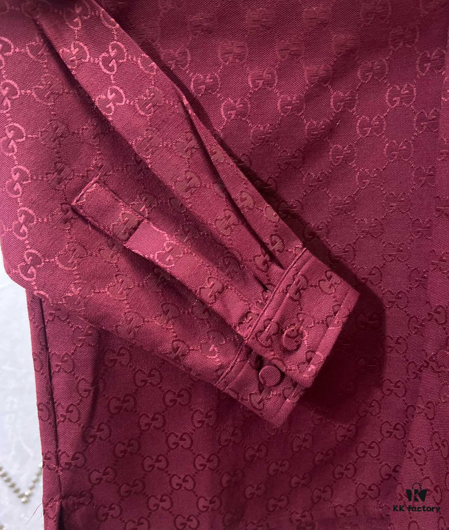 69313f29908475d562cd9b99 Gucci 25SS New Arrival Letter Intertwined Pattern Shirt Inspired by Founder Guccio Gucci's Name, Crafted in GG Canvas with Side Slits