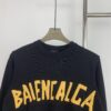69315fc6908475d562cda2a9 New Arrival Balenciaga 24SS Jacquard Yellow Tape Unisex Sweater