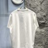 693169f9908475d562cda4aa Balenciaga Patchwork Print Logo T-Shirt