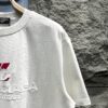 693169fa908475d562cda4ab Balenciaga Patchwork Print Logo T-Shirt