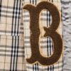 69319f6cccd8ab3d7af937ab Burberry Letter Plaid Cotton Poplin Shirt, 100% Pure Cotton, Original Quality, Custom Buttons, Chest Patch Pocket, Terry Cloth Appliqué on Sleeves, All-Over Pattern Matching, Unisex Design