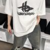 69319fcaccd8ab3d7af9383f Balenciaga Phantom Double Logo Classic Print Short Sleeve T-Shirt