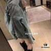 69319fd4ccd8ab3d7af938fe New Balenciaga-style Washed Vintage Denim Jacket with Back Rhinestone Lettering BLCG