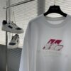 69319fd6ccd8ab3d7af93924 BALENCIAGA 25 Spring/Summer New Arrival Oversized Short Sleeve T-Shirt, Made from Custom 340g High GSM Cotton Fabric with Heavy Rust-Effect Woven Rubber Print on Chest, Distressed Raw Trims at Cuffs and Hem