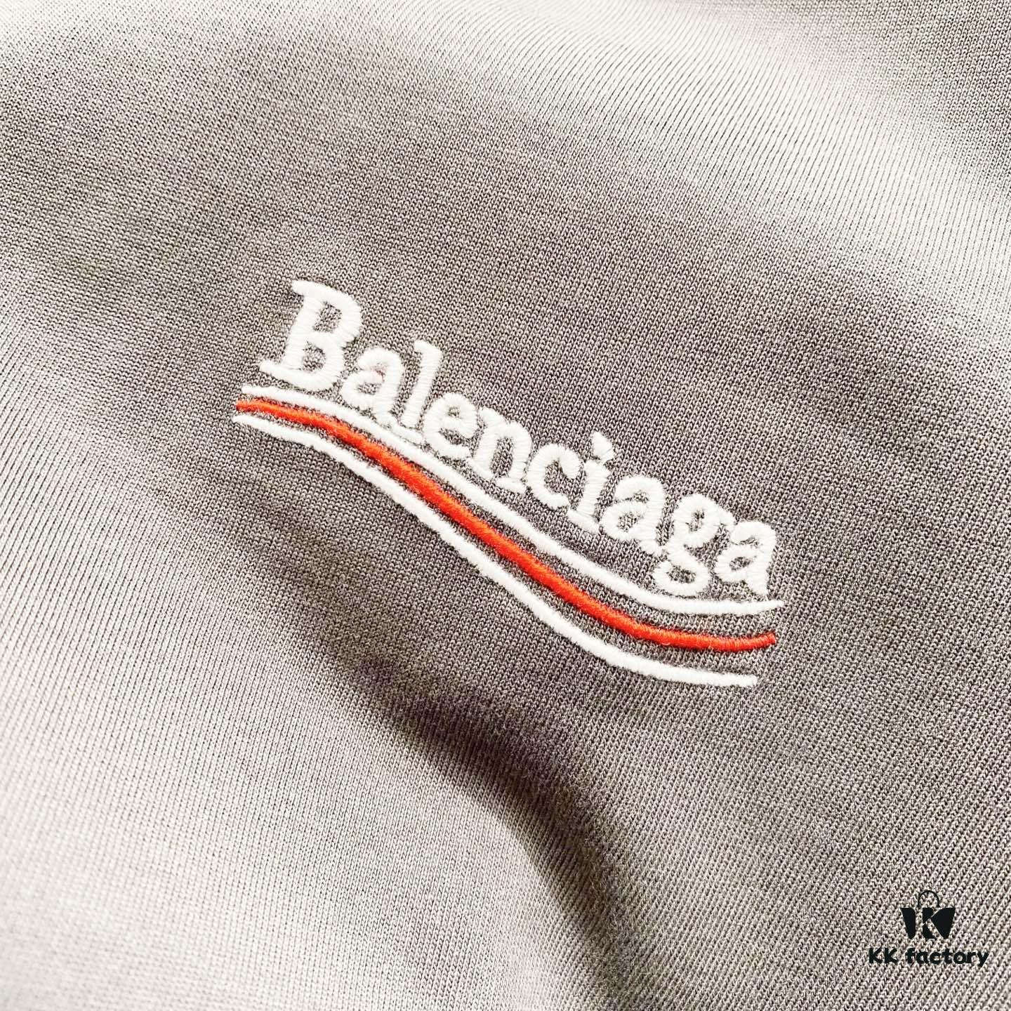 69319fdaccd8ab3d7af9396b BALENCIAGA 320g Washed Short-Sleeve T-Shirt with Wavy Coke Embroidery and Logo Design