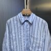 6931a04fccd8ab3d7af94122 DR🔥Dior Men's Collection Fashion Show Debut, Stylishly Tailored Blue Striped Cotton Workwear-Inspired Oversized Jacket with Christian Couture Embroidery, Unisex Design