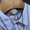 6931a050ccd8ab3d7af94126 DR🔥Dior Men's Collection Fashion Show Debut, Stylishly Tailored Blue Striped Cotton Workwear-Inspired Oversized Jacket with Christian Couture Embroidery, Unisex Design
