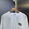 6931a050ccd8ab3d7af94132 Dior Charm Logo Patch Short-Sleeve T-Shirt